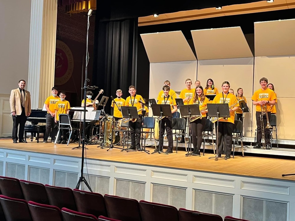 Tipton Middle School Jazz Band on stage with conductor