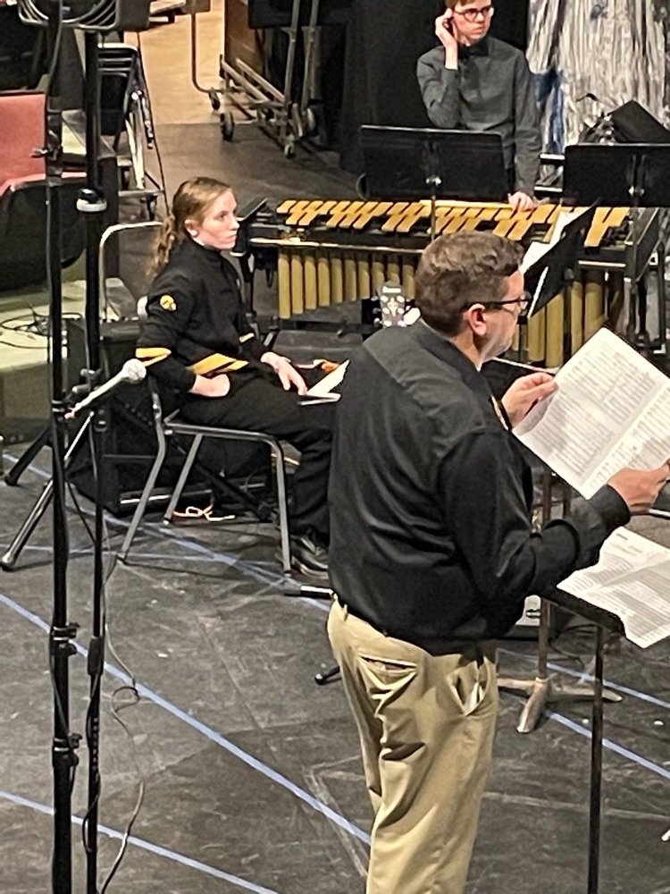 Mr. Owen working with the HS band  